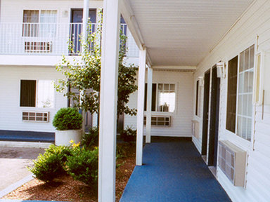 Hotel PASSPORT INN AND SUITES